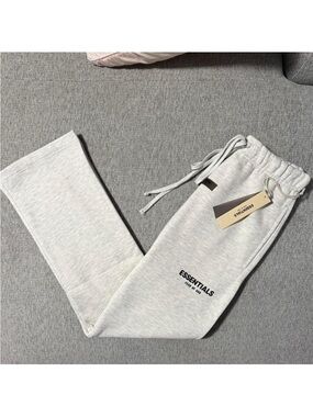 Essentials Men’s Light otm  Sweatpants with Logo